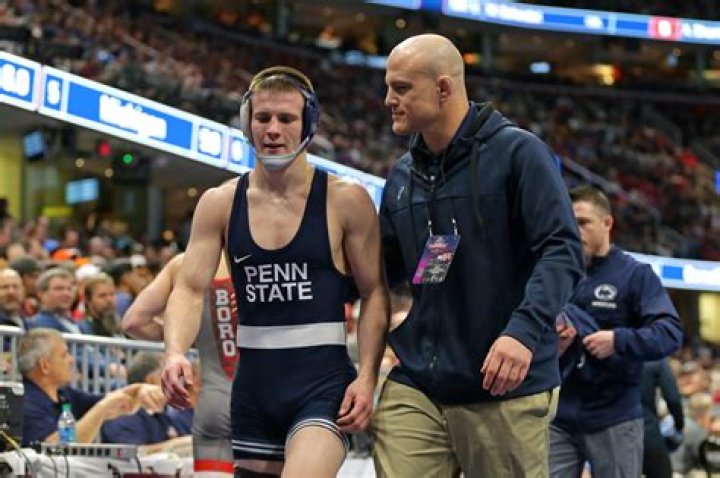 Pennsylvania State University wrestling head coach, Cael Sanderson's net worth is $0.5 million, How much is his salary in 2021? Is he married?