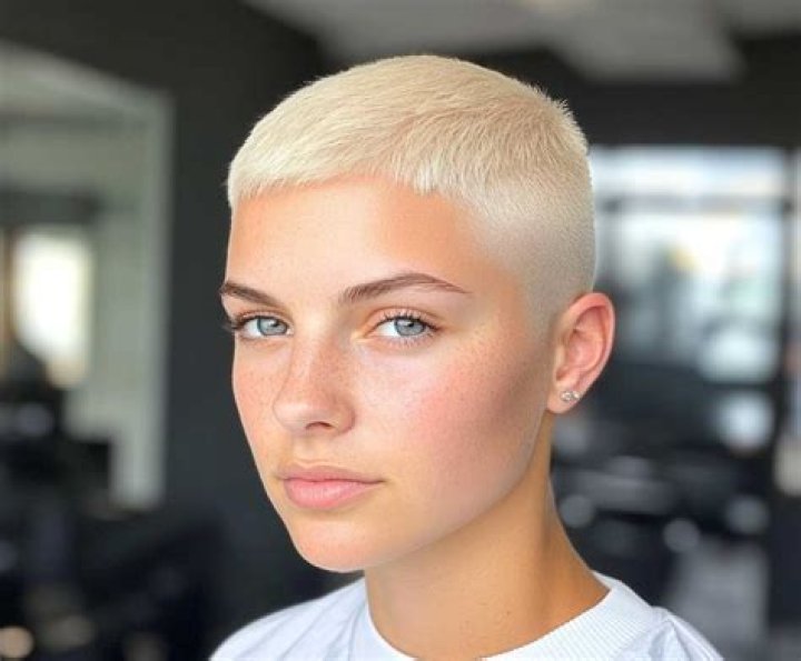 See Jude Law's Model Daughter Iris Reveal Her Blonde Buzz Cut